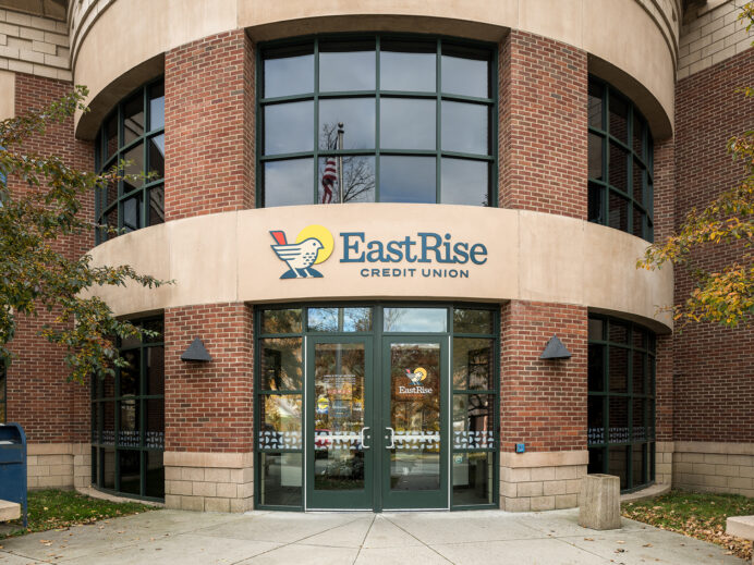 Outside of EastRise Credit Union branch showing exterior signage and door design